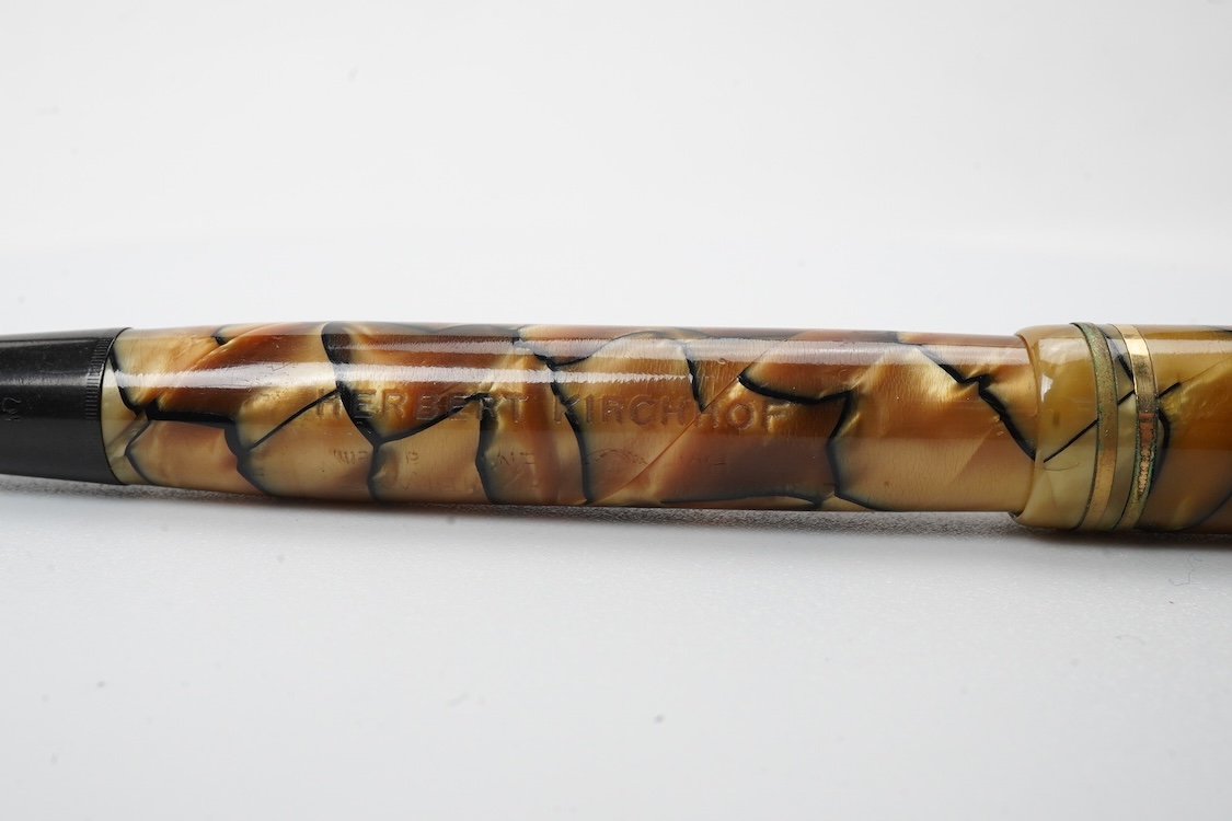 A Montblanc black and pearl fountain pen marked No.322 button filler
